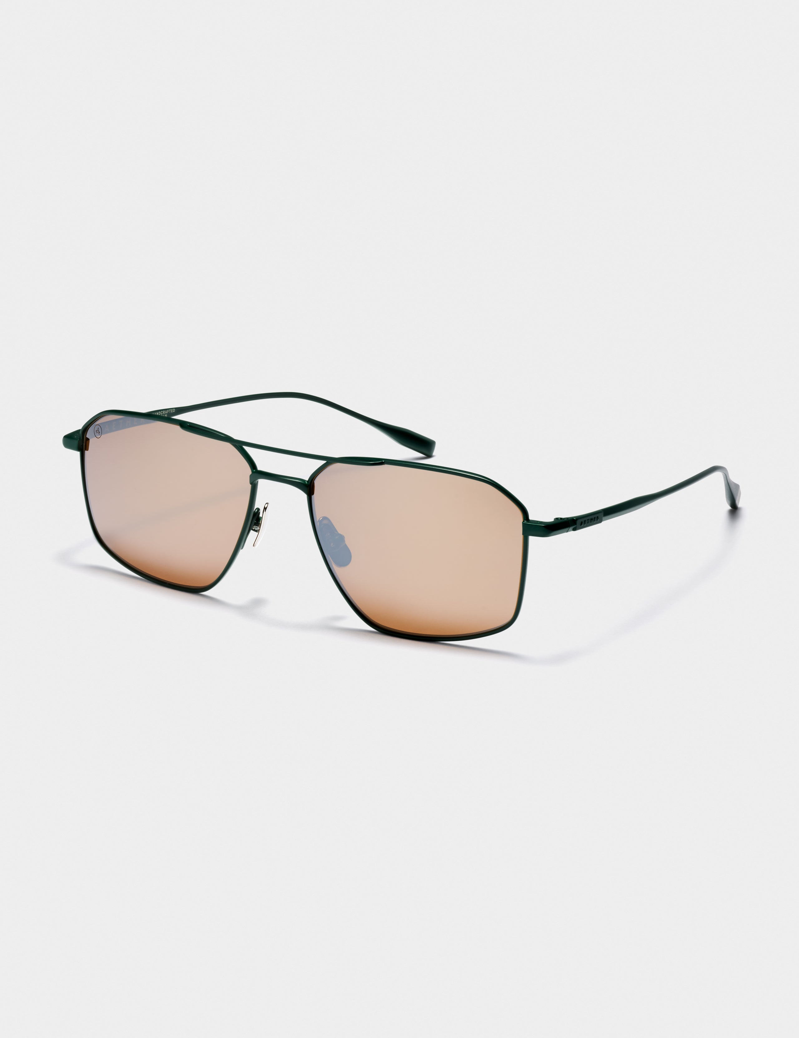 Front angled view of Arches Sunglass in Green with Brown Lens from AETHER Apparel. 