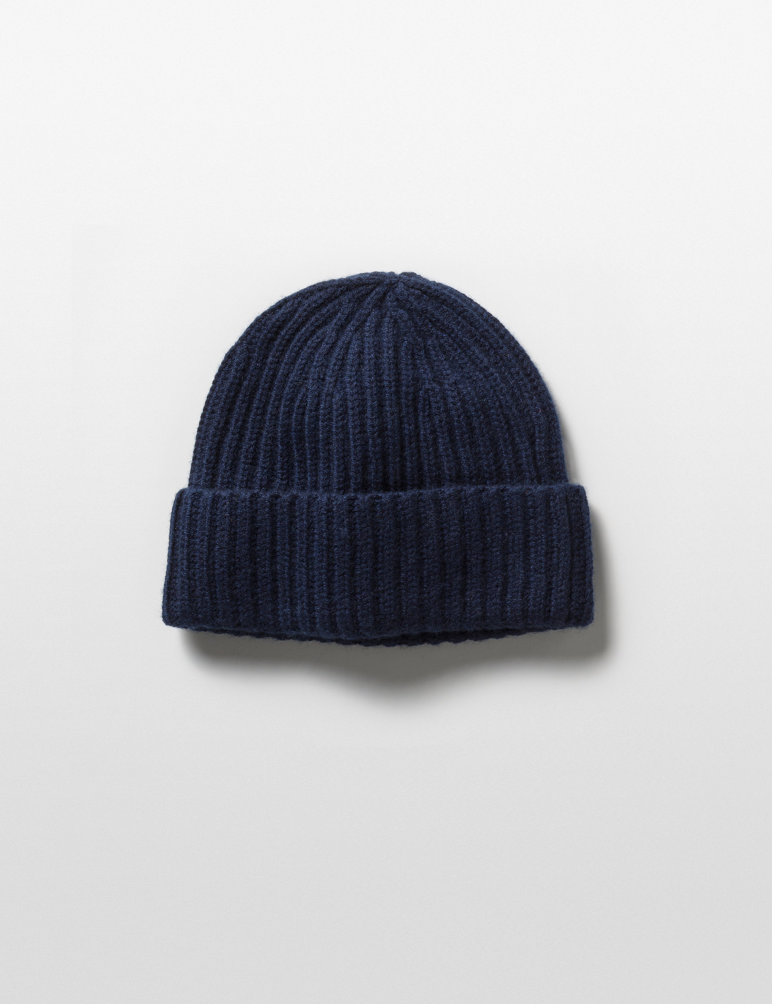 Flat lay view of Cashmere Hat in Total Eclipse Dark Blue from AETHER Apparel. 