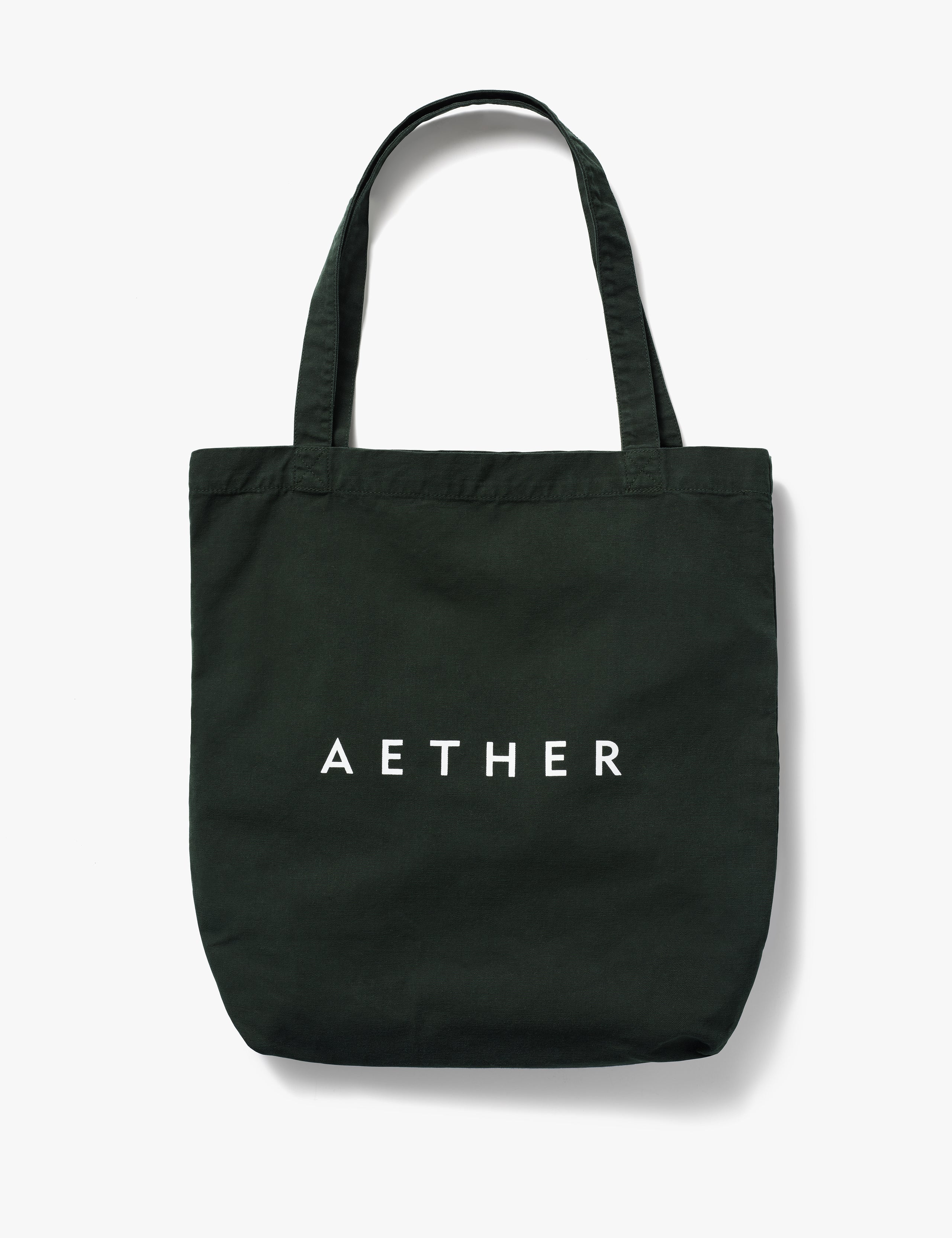Flat lay of front side of Lifestyle Canvas Tote in Duffle Green from AETHER Apparel. 