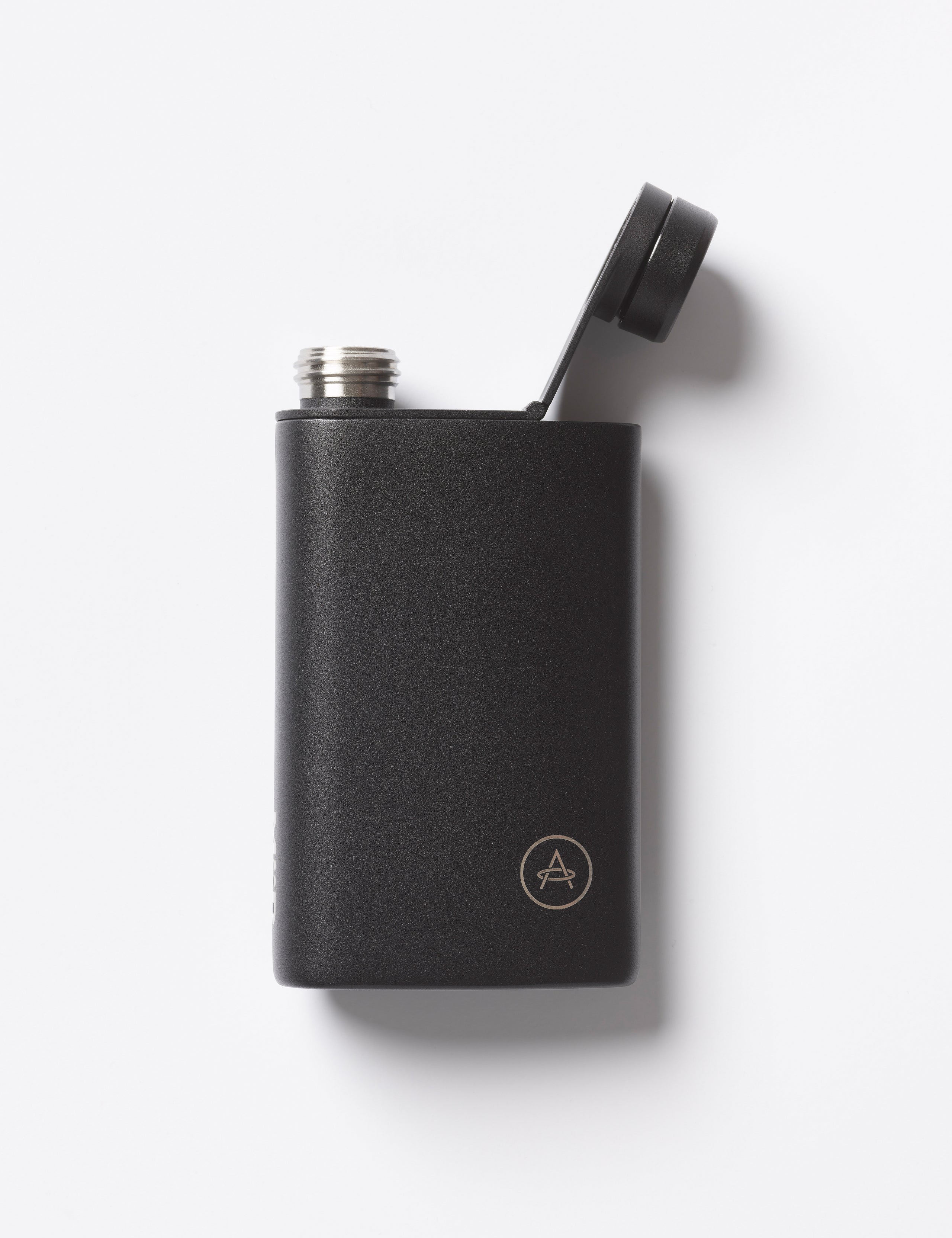 Flat lay view of front side of AETHER + Miir Aero Flask in Black with top open.
