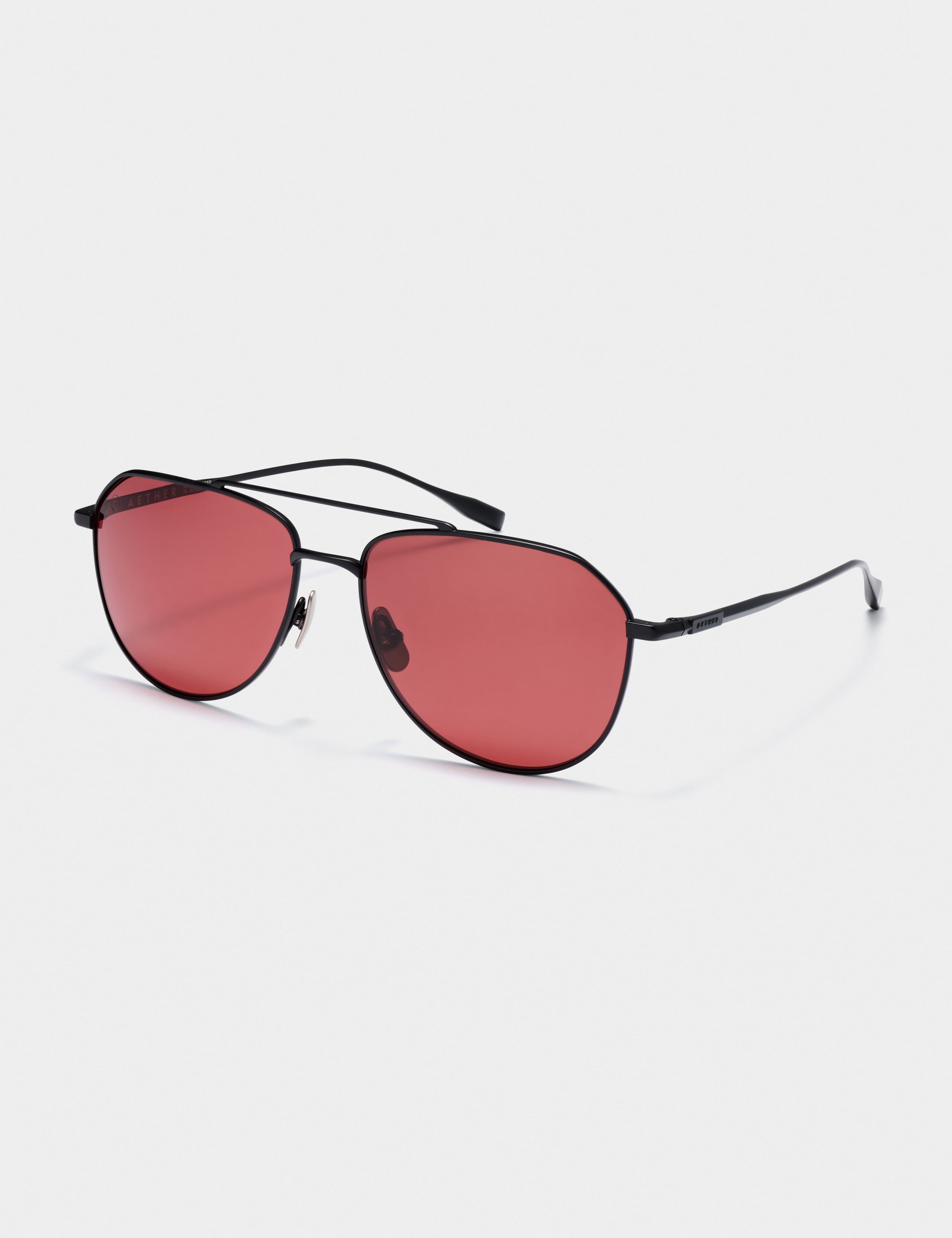 Front 3/4 view of Bryce Sunglass in black titanium with Red Lens from AETHER Apparel.