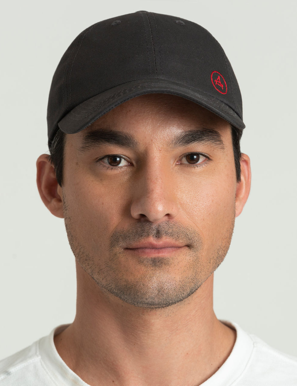 Front view of man wearing Everyday Hat in Graphite from AETHER Apparel.