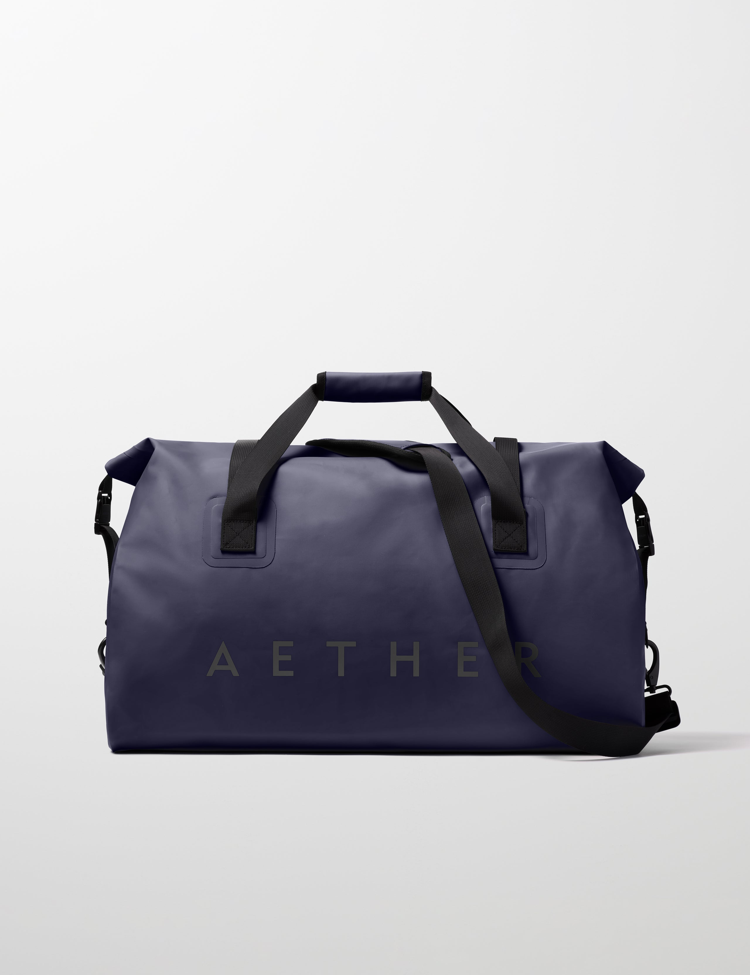 Rear view of Excursion Duffle Bag 60L in Total Eclipse dark blue from AETHER Apparel.