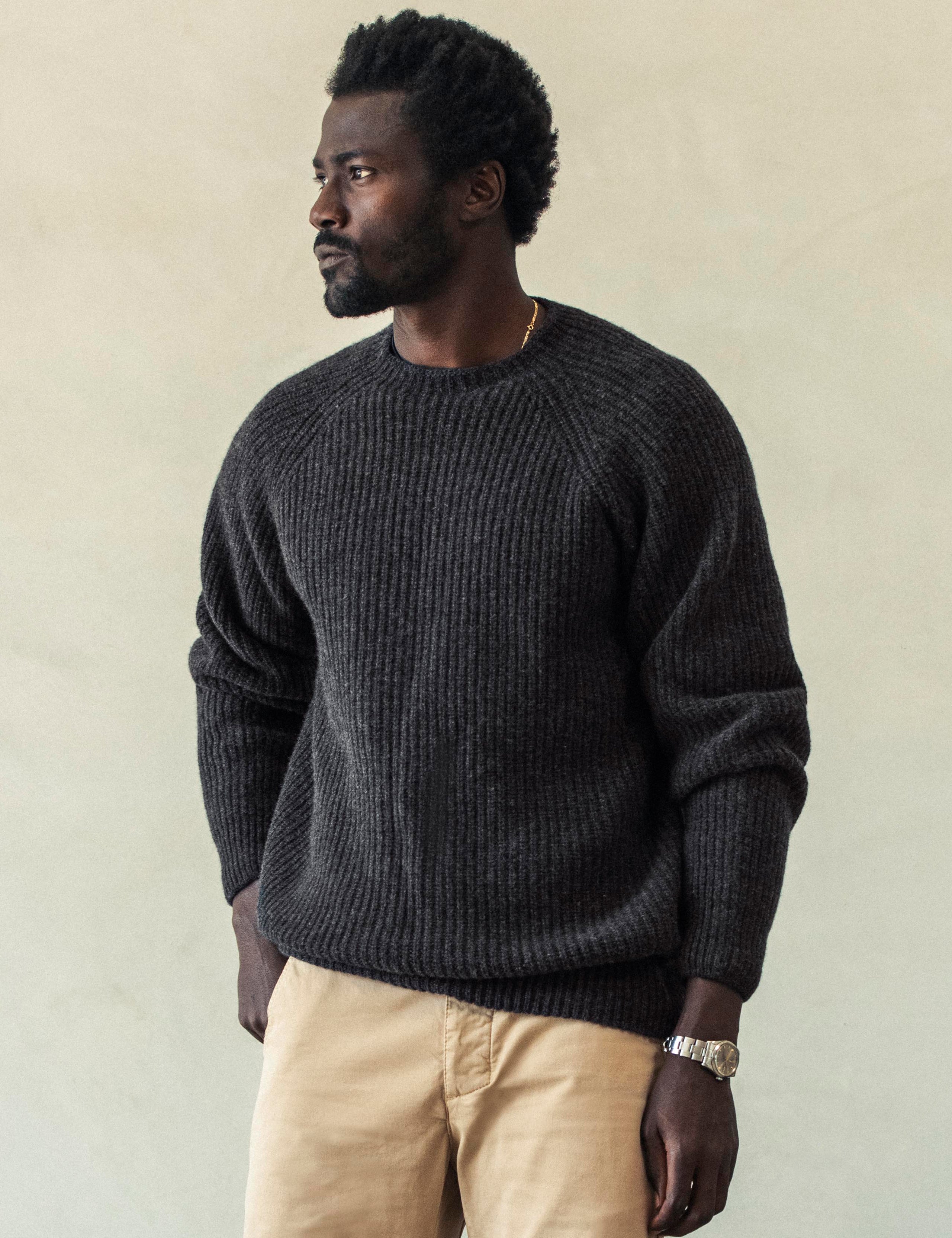 Front body view of man wearing Camden Crewneck Sweater In Charcoal Heather from AETHER Apparel.