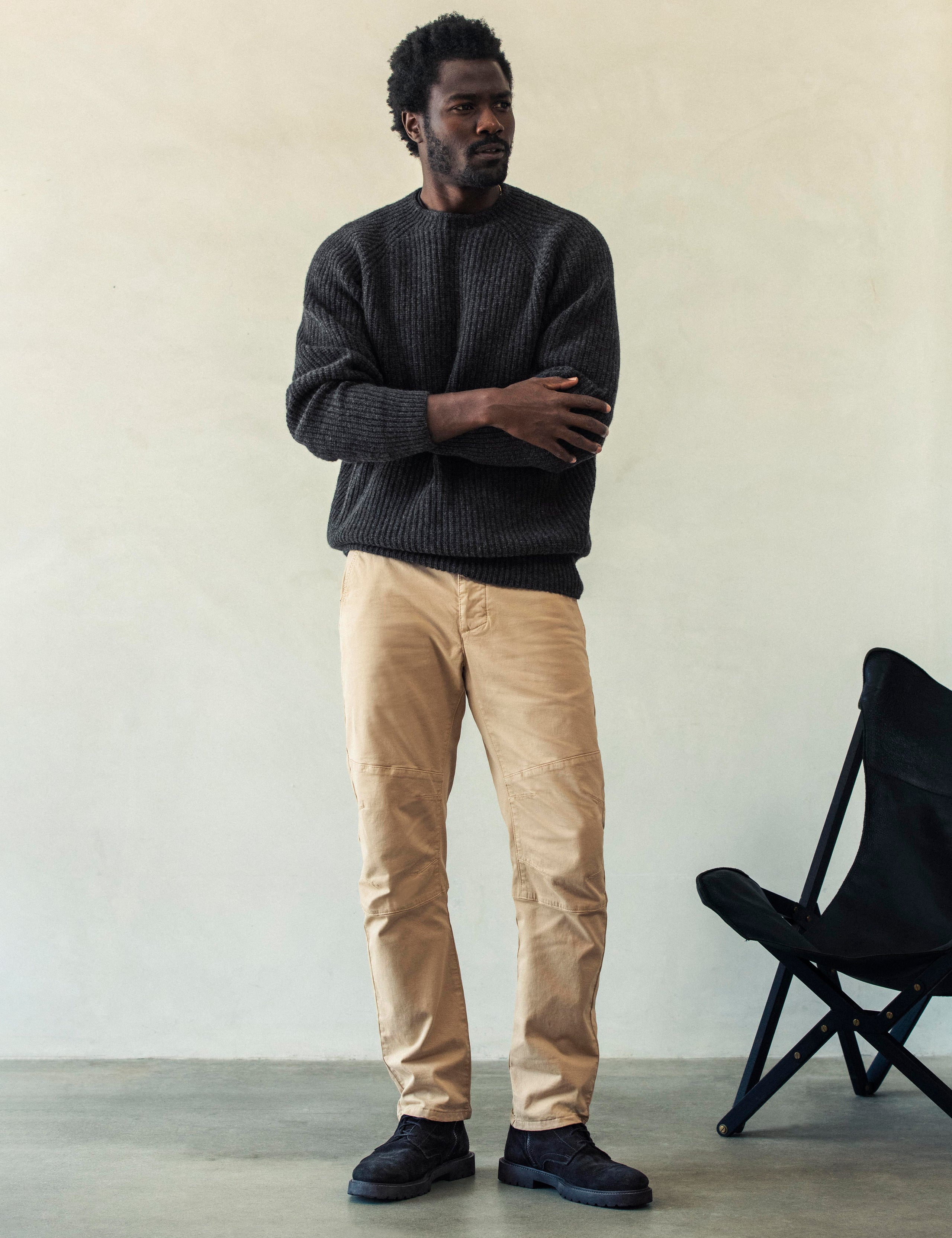 Front full-body view of man wearing Camden Crewneck Sweater In Charcoal Heather from AETHER Apparel.