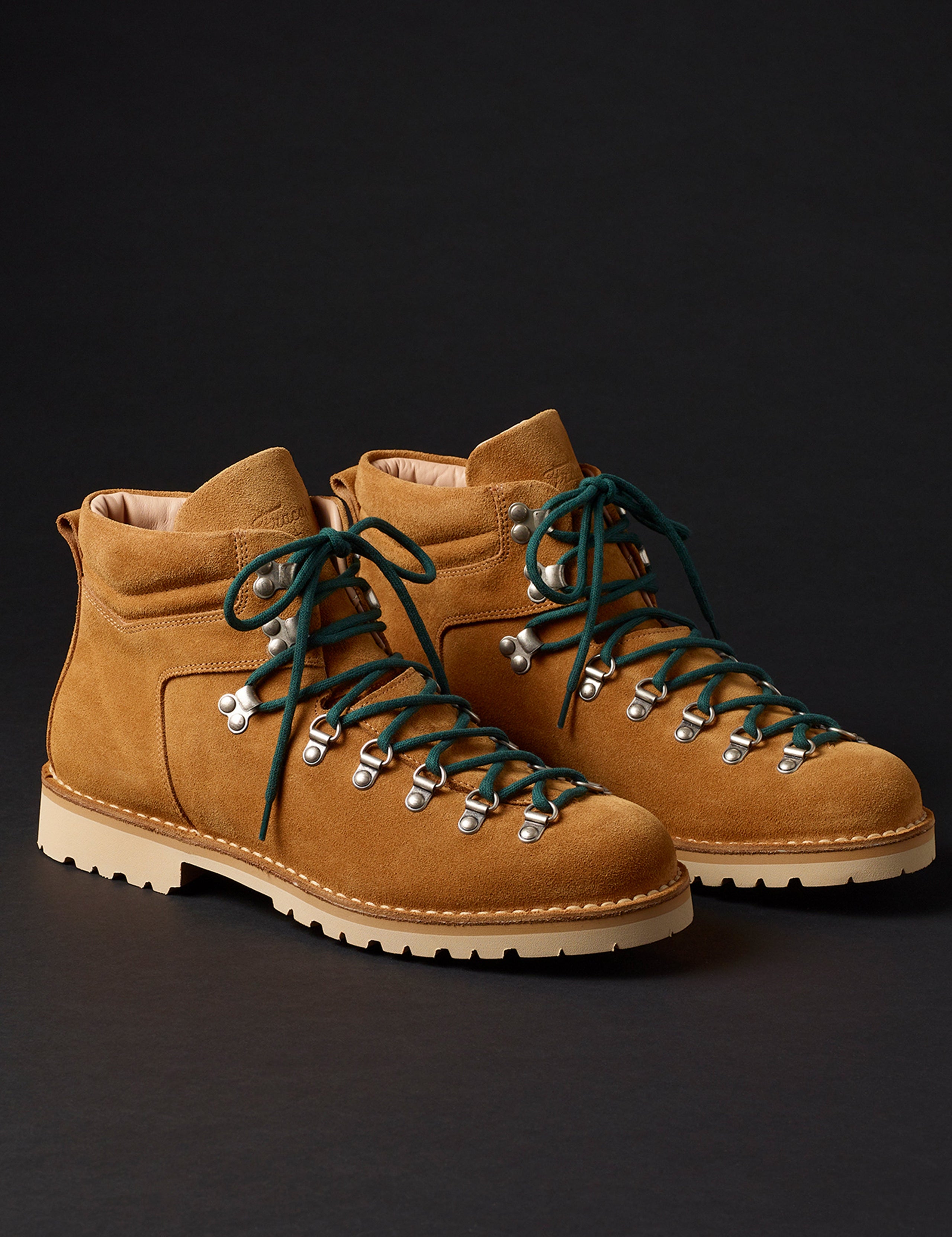 Front angled view of men’s Dolomite Boot in Camel with green laces from AETHER Apparel.