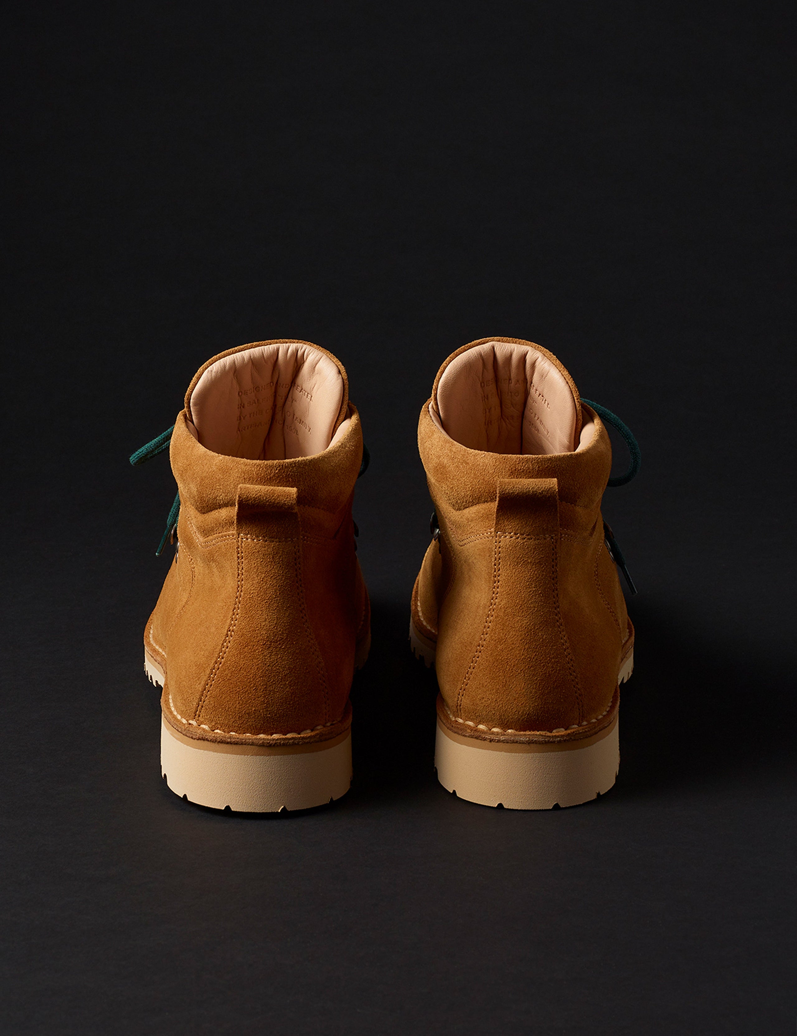 Rear view of men’s Dolomite Boot in Camel with green laces from AETHER Apparel.