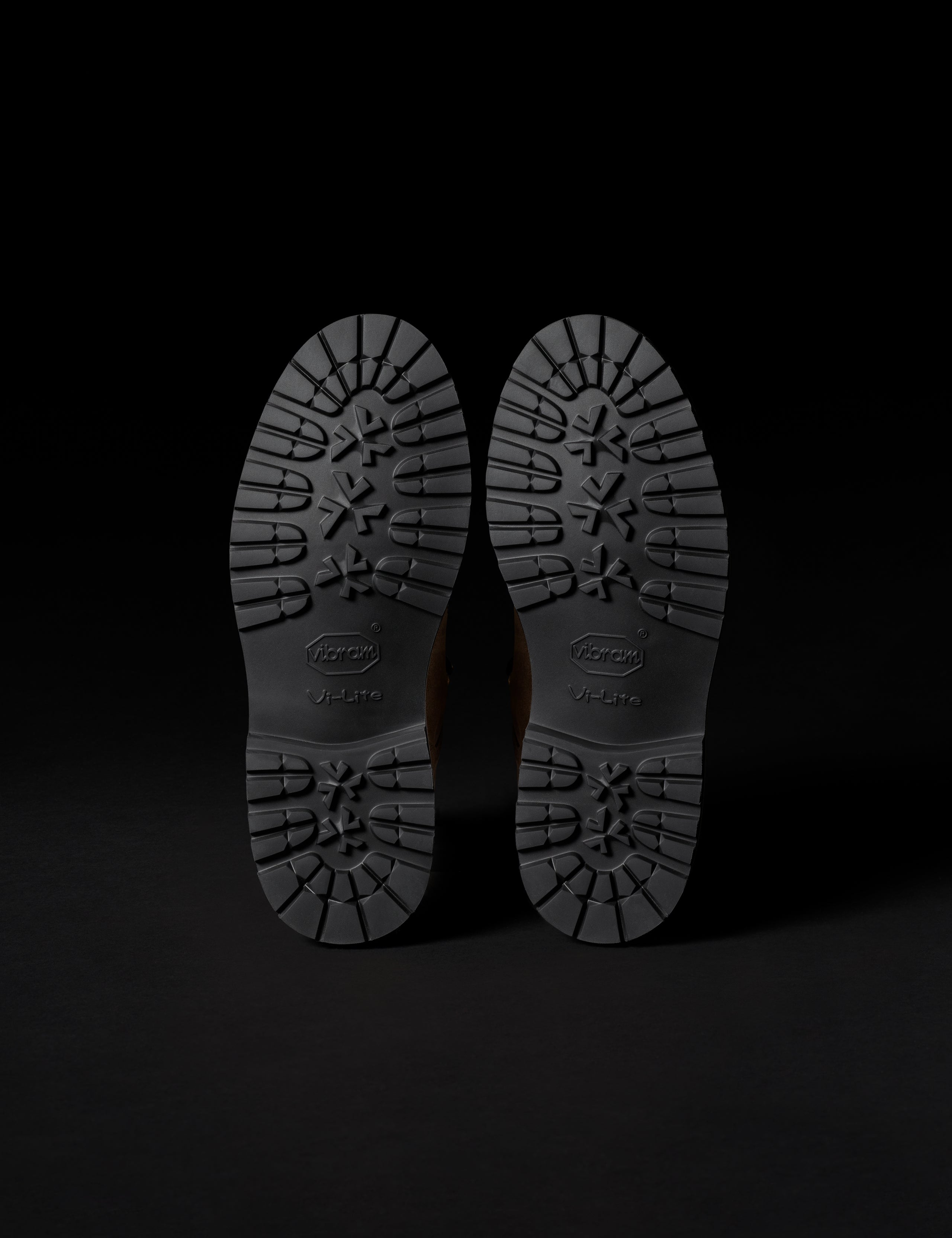 View of bottom of Vibram Vi Lite outsoles on men's Dolomite Boot in Taupe from AETHER Apparel.