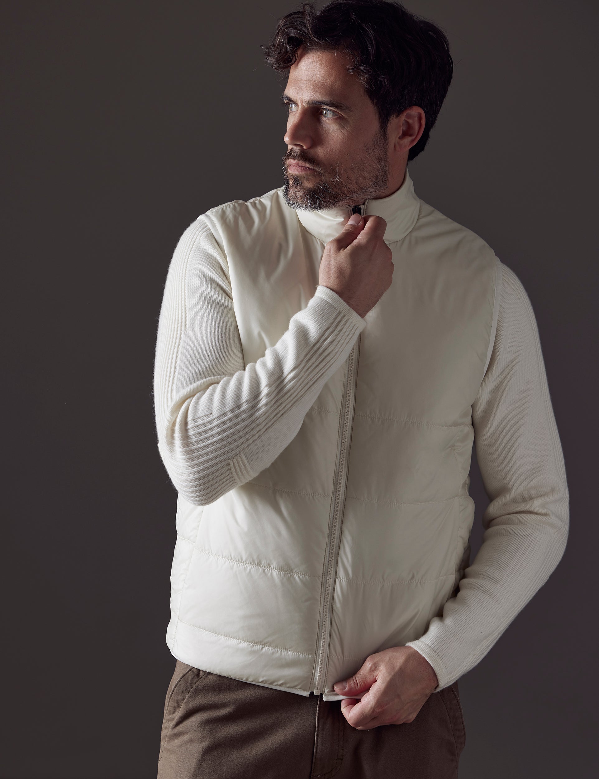 Front body view of man wearing Eco Insulated Vest in Winter White from AETHER Apparel.