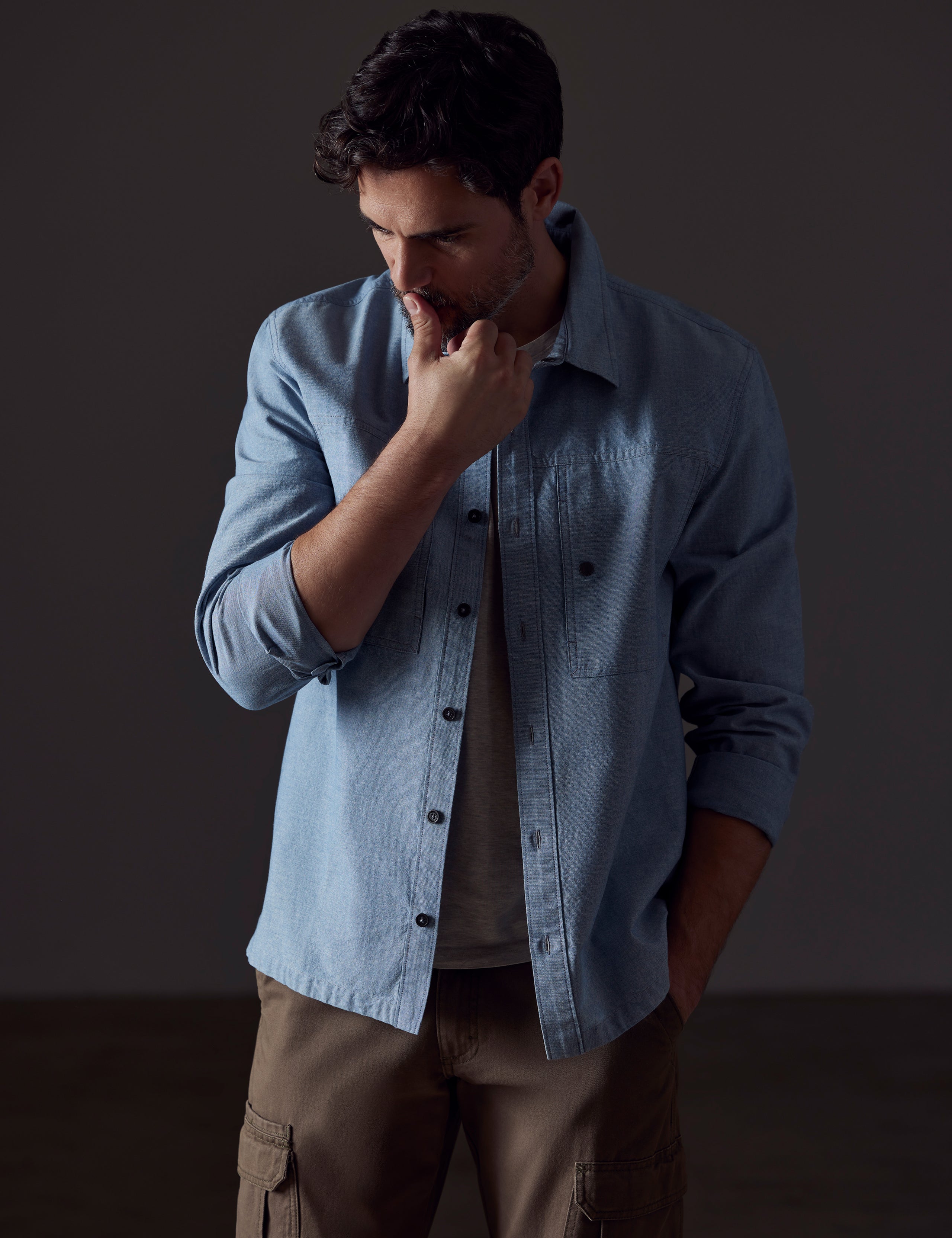 Front body view of man wearing Emerson Button Down in Light Blue from AETHER Apparel.