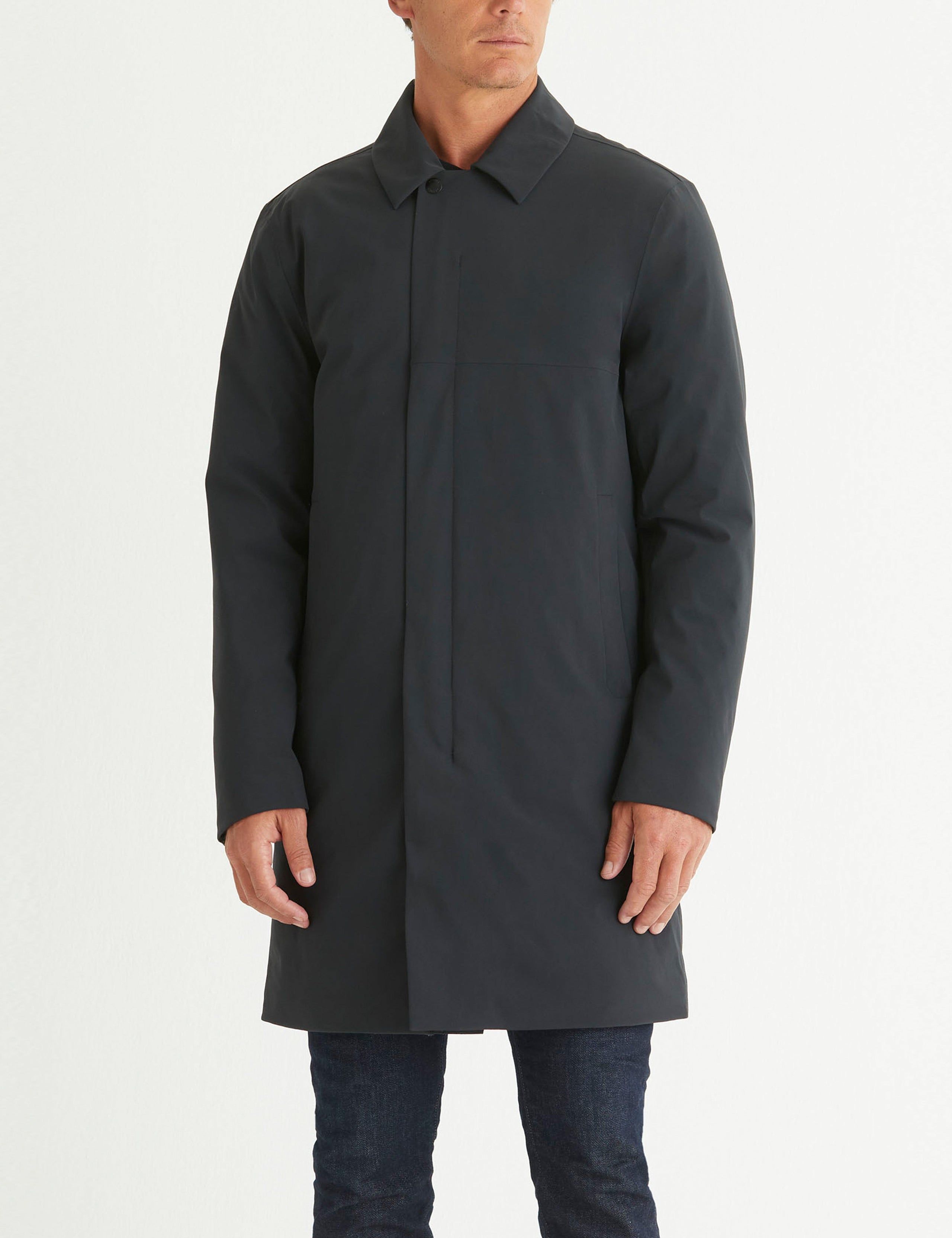 Front body view of man wearing Isaac Jacket in Onyx Black from AETHER Apparel.