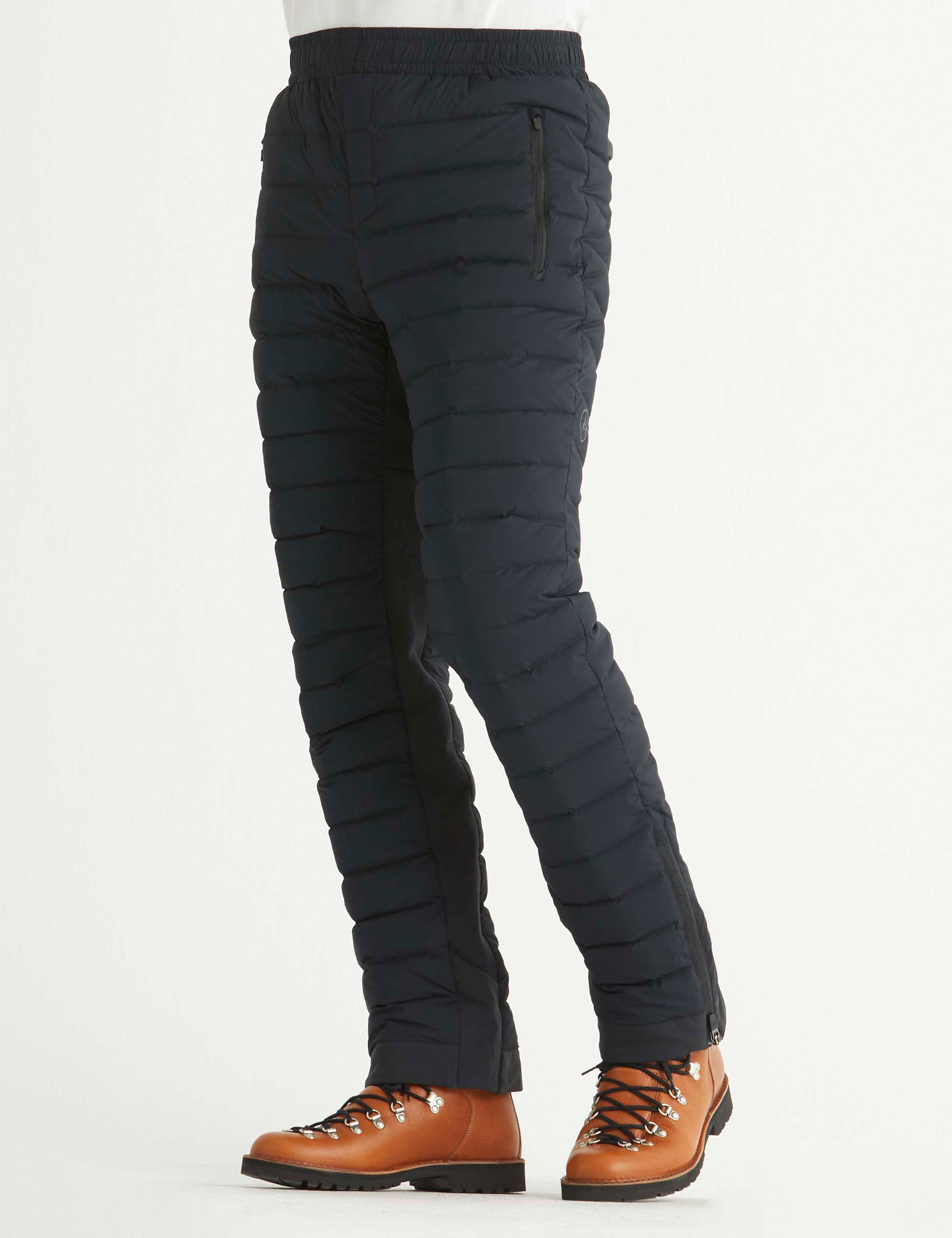 Front angled lower body view of man wearing Launch Pant in Onyx Black from AETHER Apparel. 