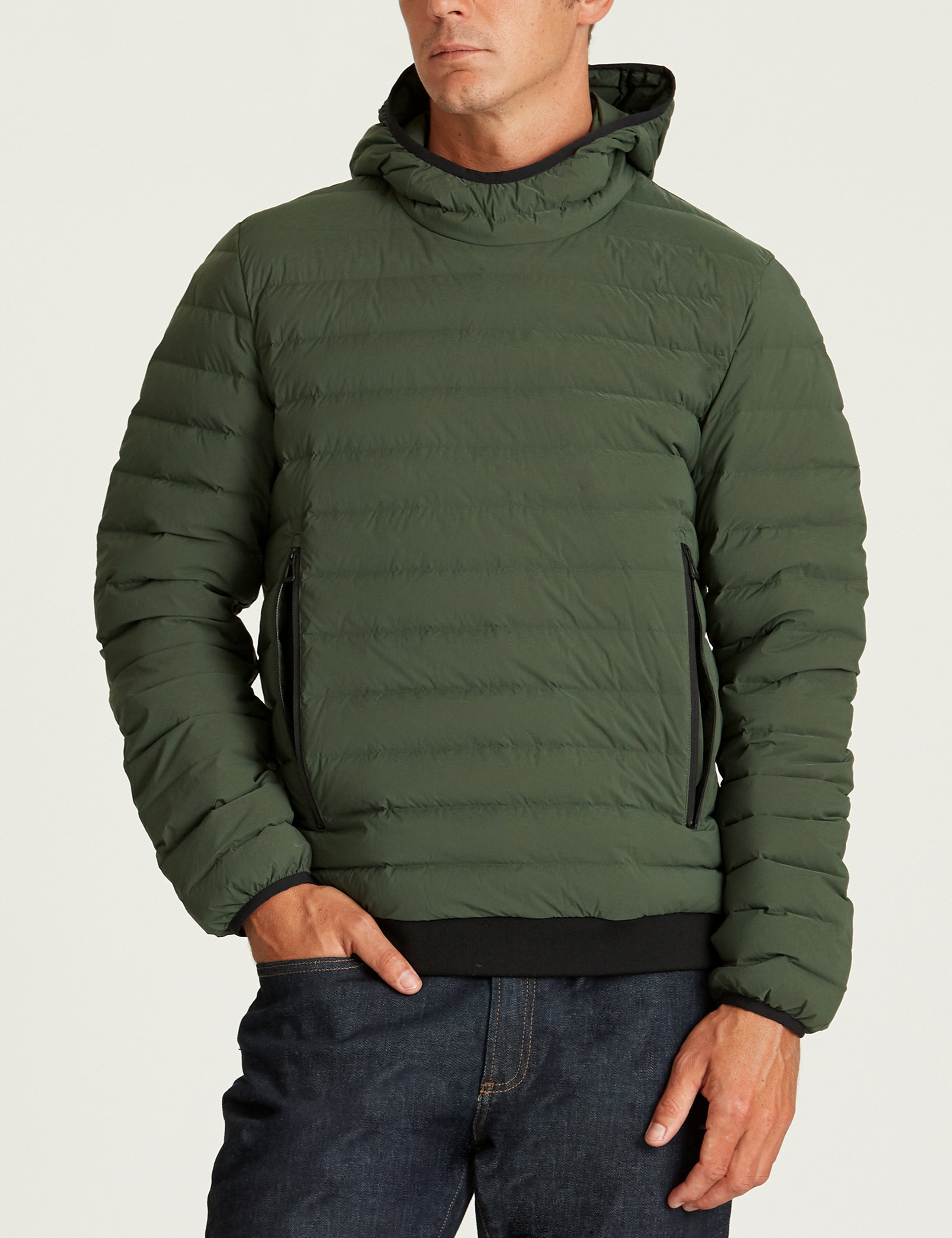 Front body view of man wearing Launch Pullover in Duffle Green from AETHER Apparel.