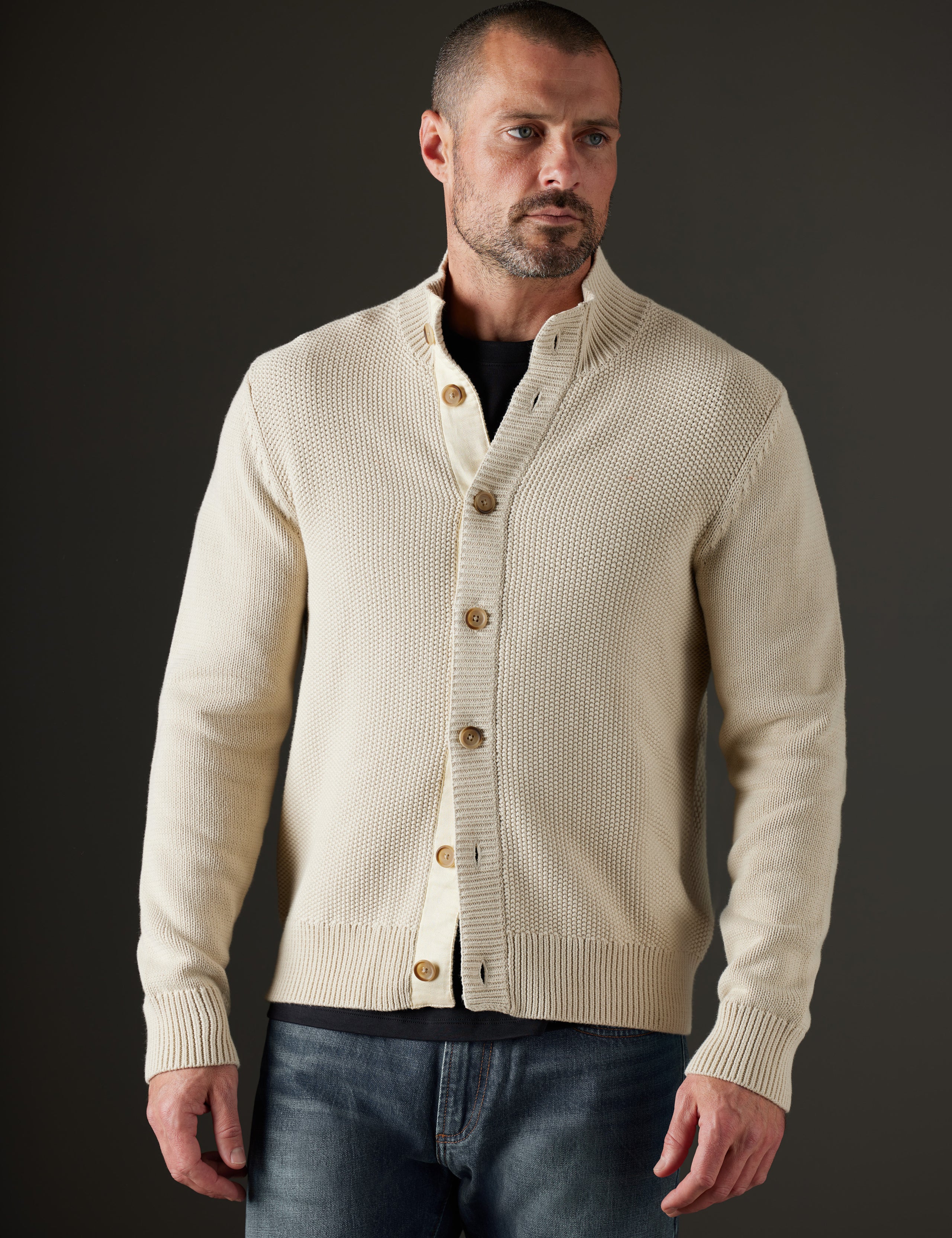 Front body view of man wearing Oliver Cotton Button-Up Sweater in Bone white from AETHER Apparel.