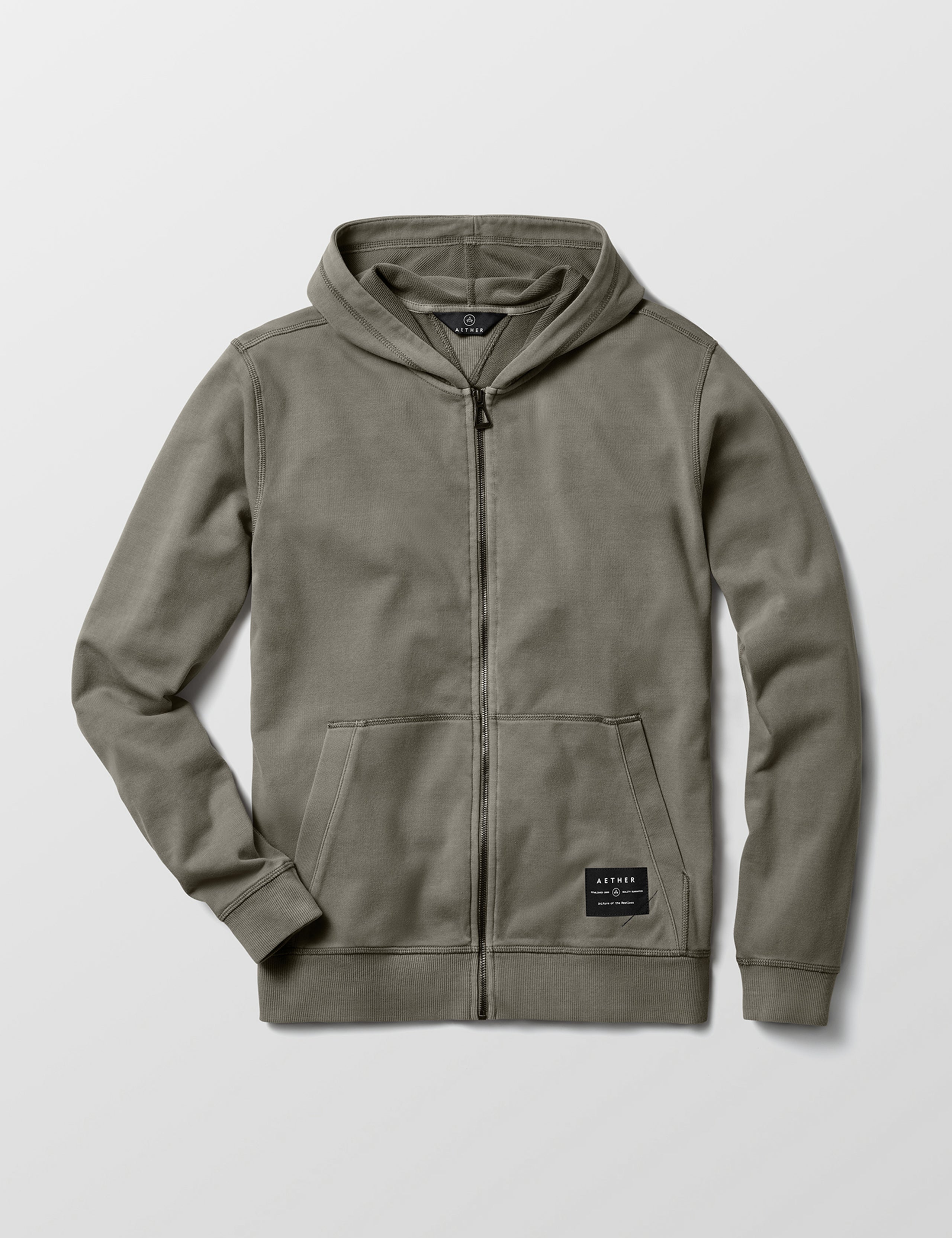 Flat lay of men's Solstice Lightweight Full-Zip Hoodie in Command Green from AETHER Apparel.
