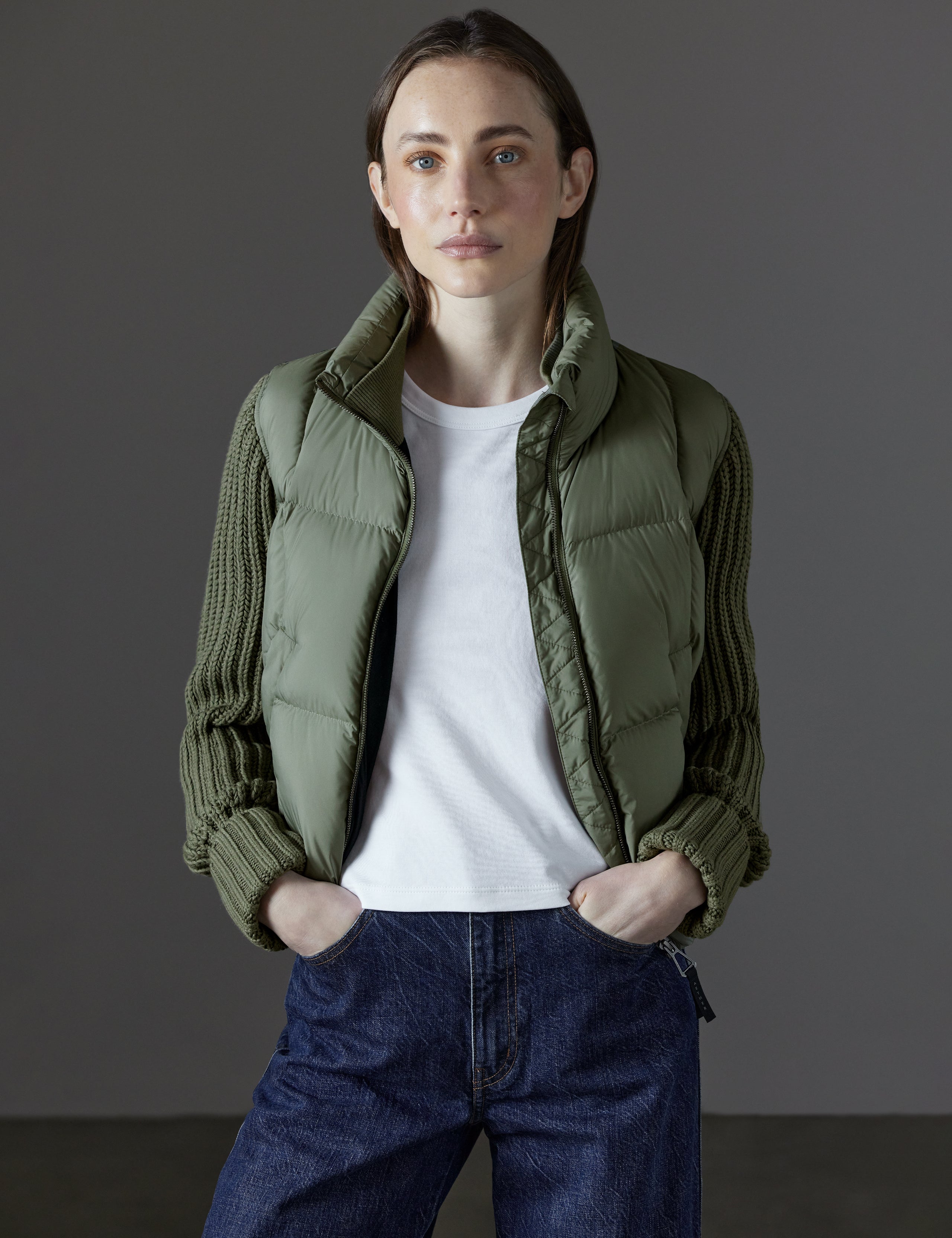 Front view of woman wearing unzipped Nina Cardigan-Sleeve Jacket in Fern Green from AETHER Apparel.