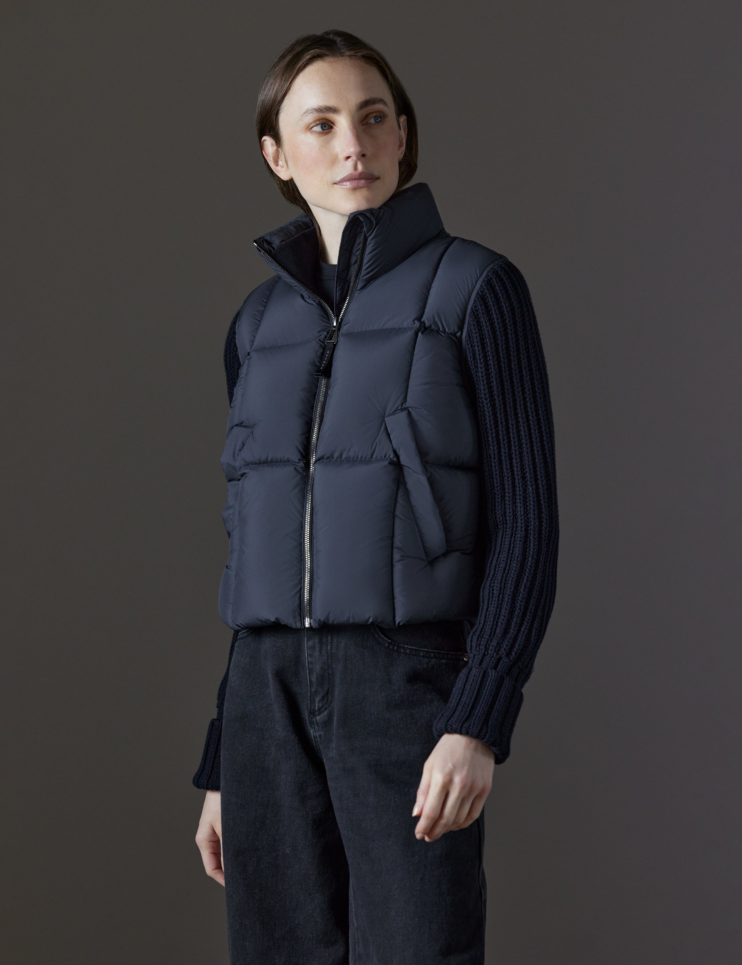 Front angled view of woman wearing Nina Cardigan-Sleeve Jacket in Onyx Black from AETHER Apparel.