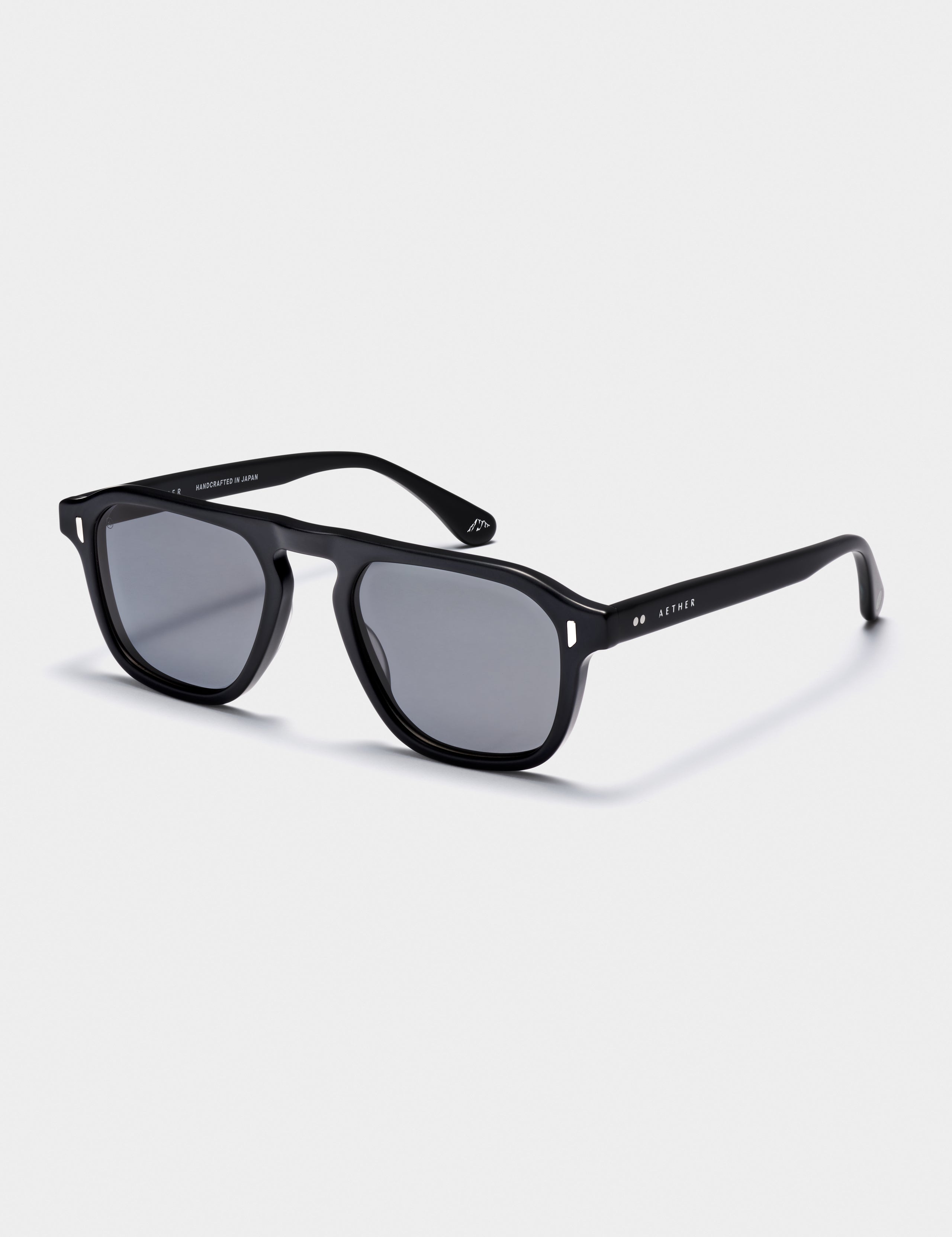 Front 3/4 view of Sequoia Sunglass in Matte Black with Grey Lens from AETHER Apparel.