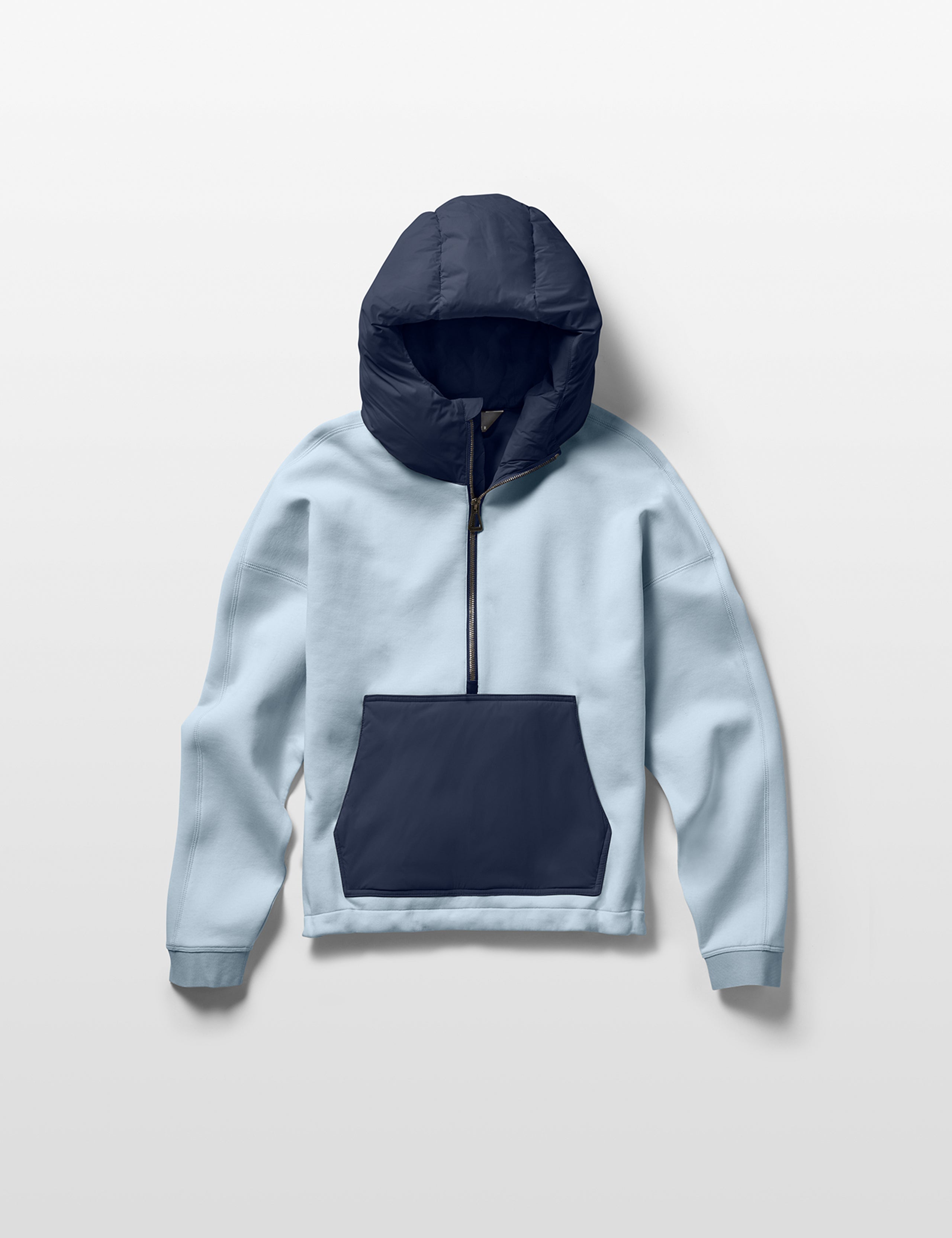 Flay lay of women's Align Hooded Anorak in Flight Blue from AETHER Apparel.