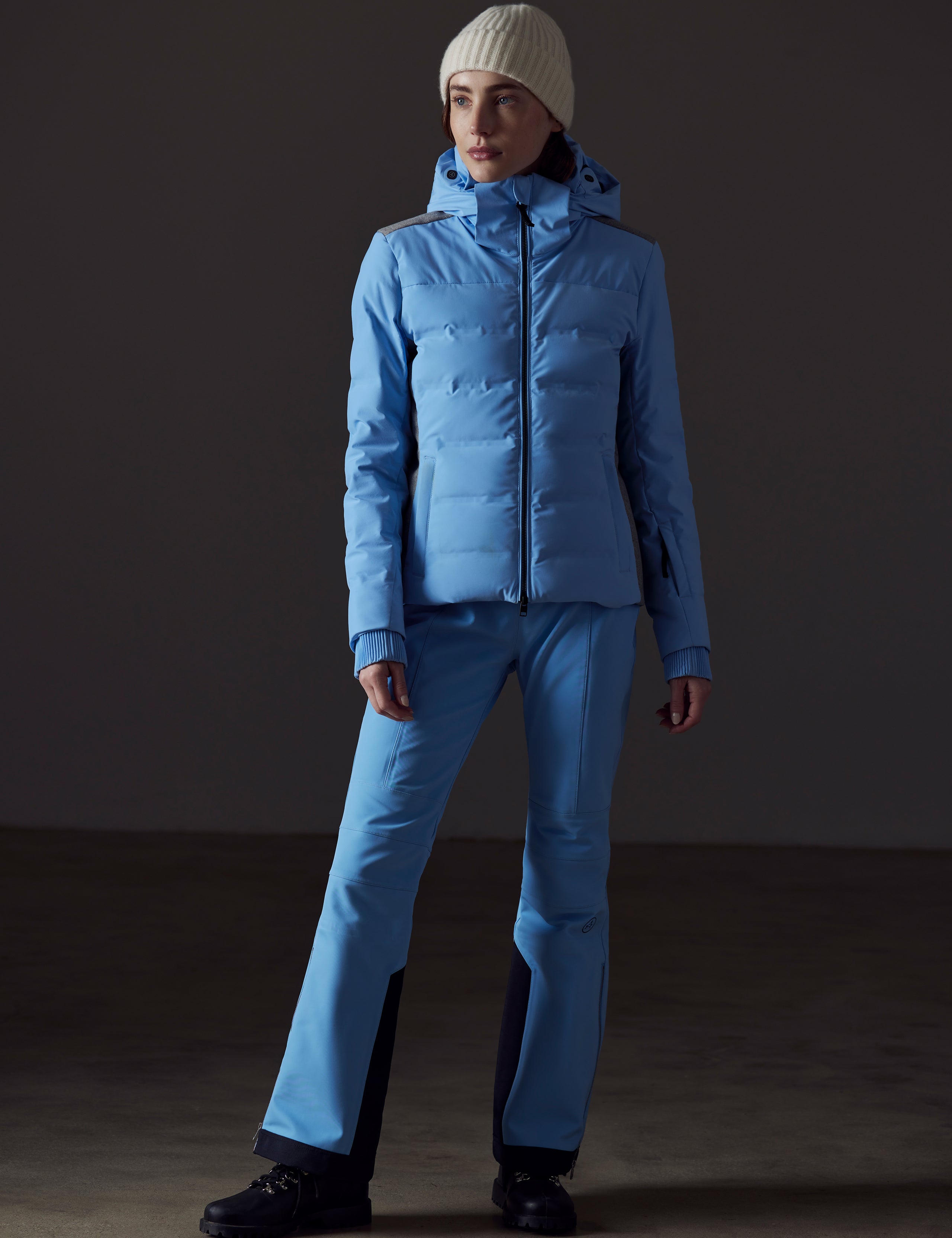 Front full-body view of woman wearing Bancroft Snow Jacket in Atlas Blue from AETHER Apparel.