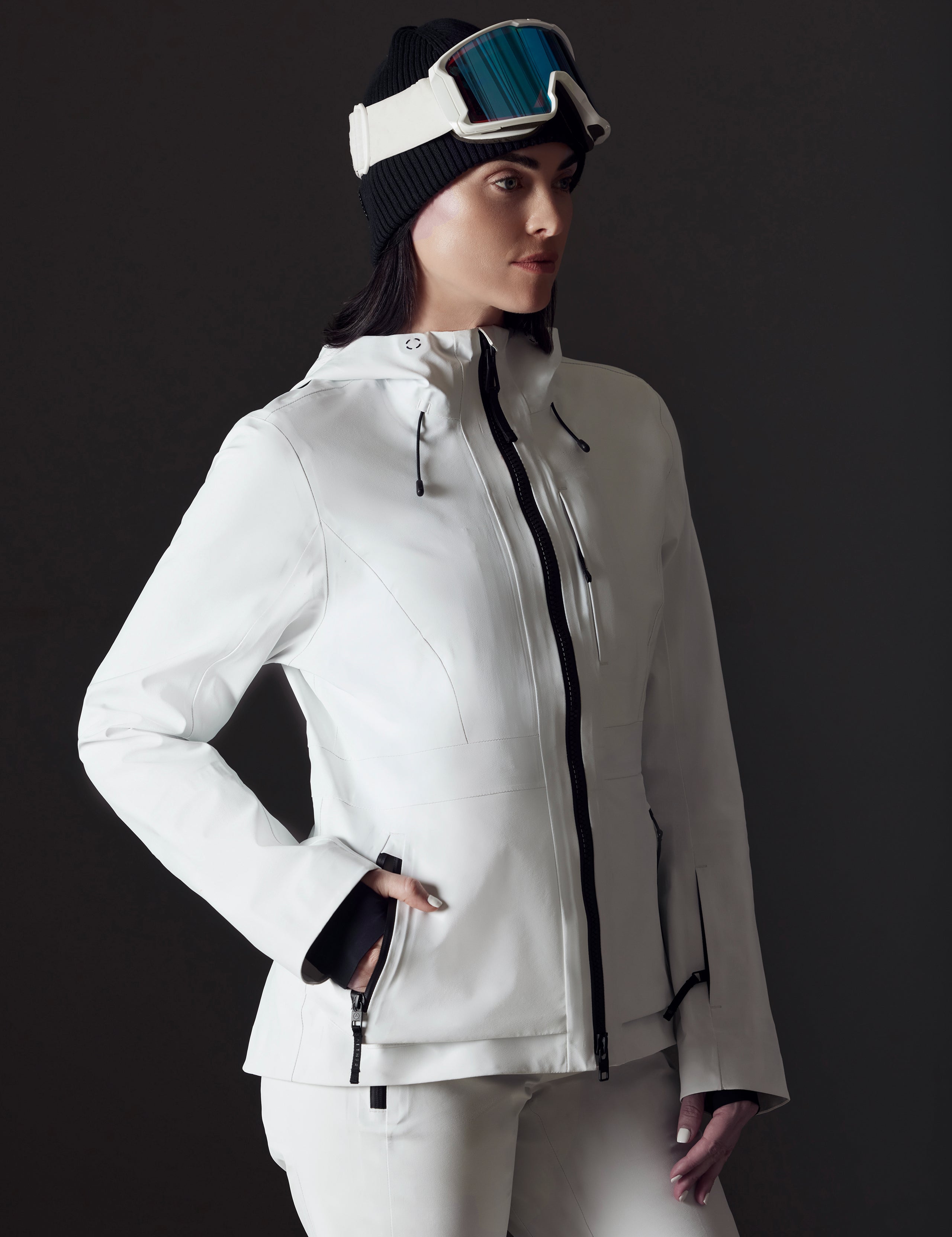 Front angled view of woman wearing Boyd Snow Jacket in White from AETHER Apparel.