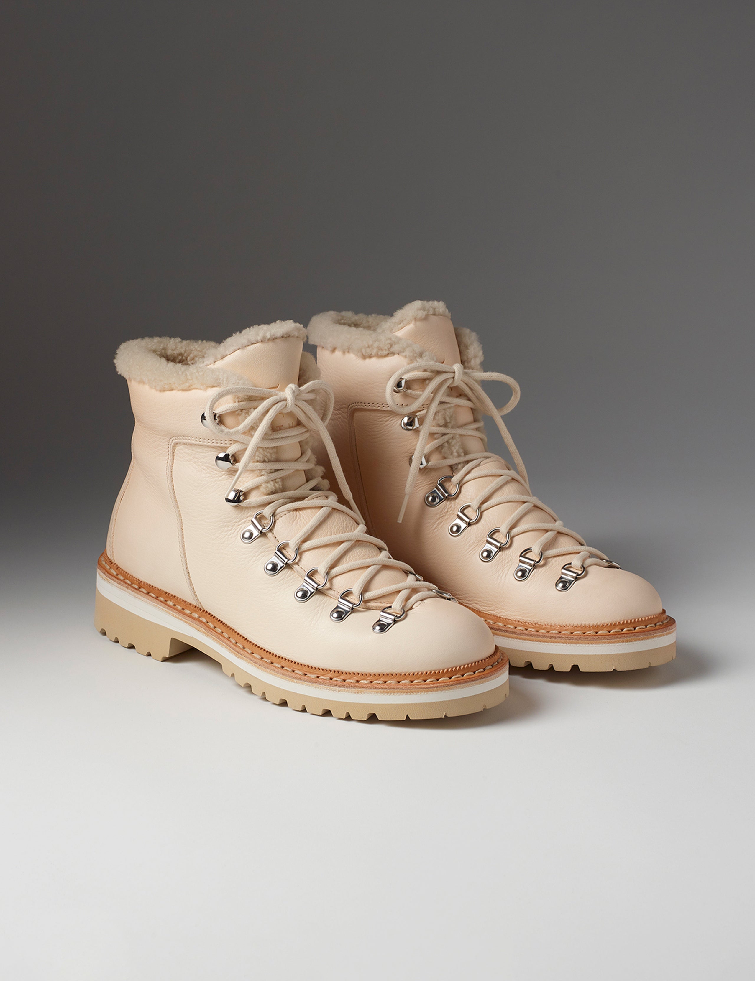 Front angled view of women's Dolomite Boot with Shearling in Cream from AETHER Apparel with cream laces.