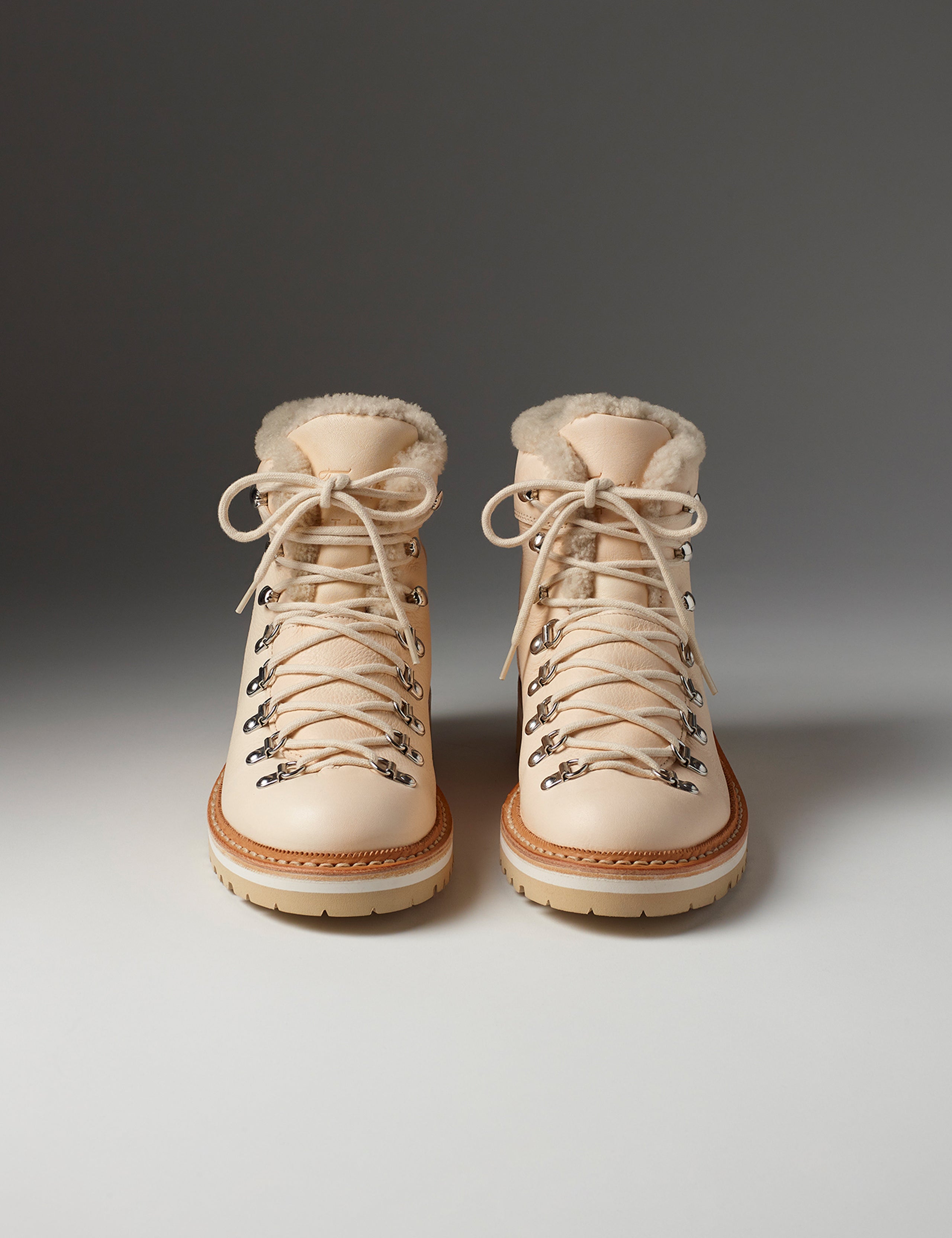 Front view of women's Dolomite Boot with Shearling in Cream from AETHER Apparel with cream laces.
