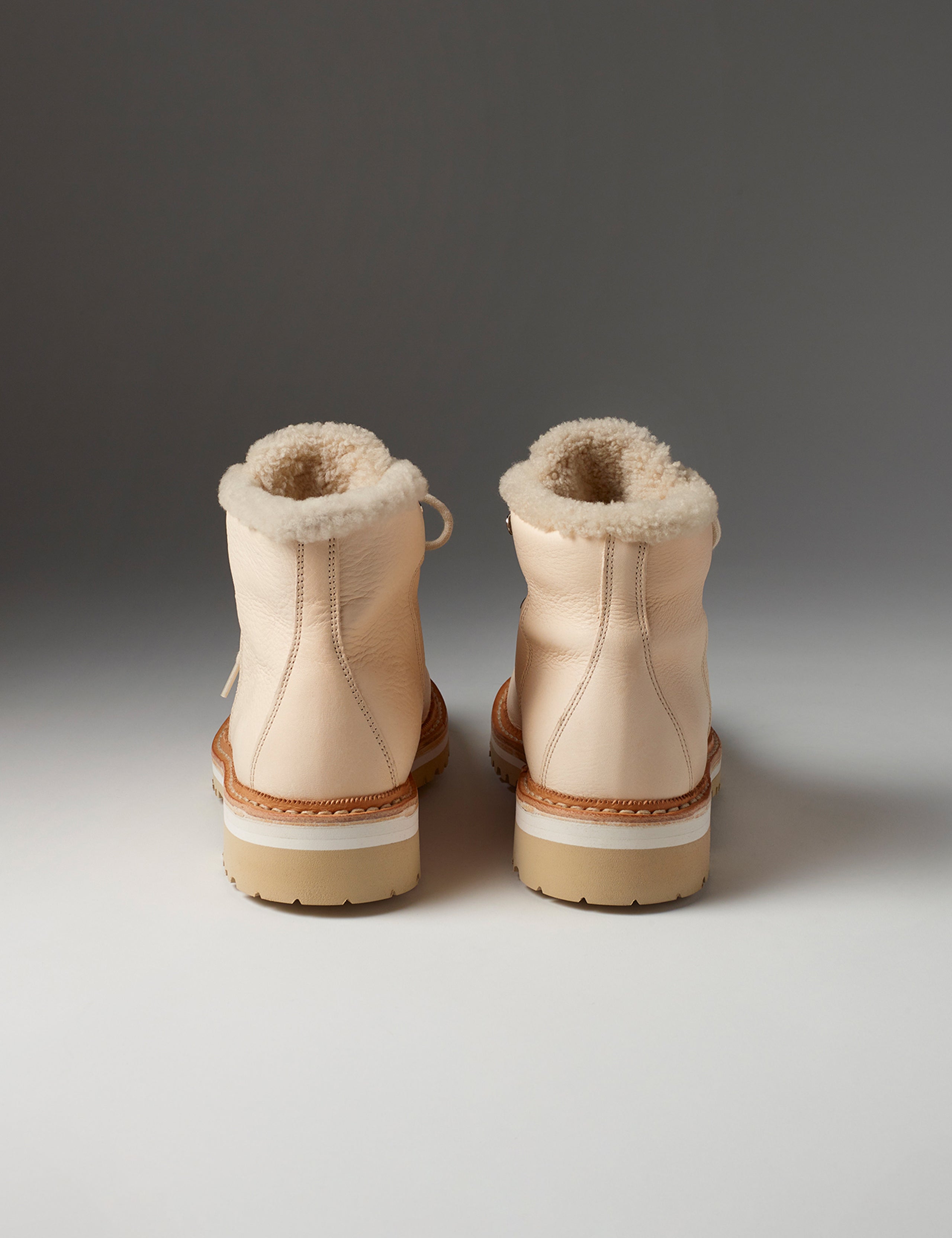 Rear view of women's Dolomite Boot with Shearling in Cream from AETHER Apparel with cream laces.