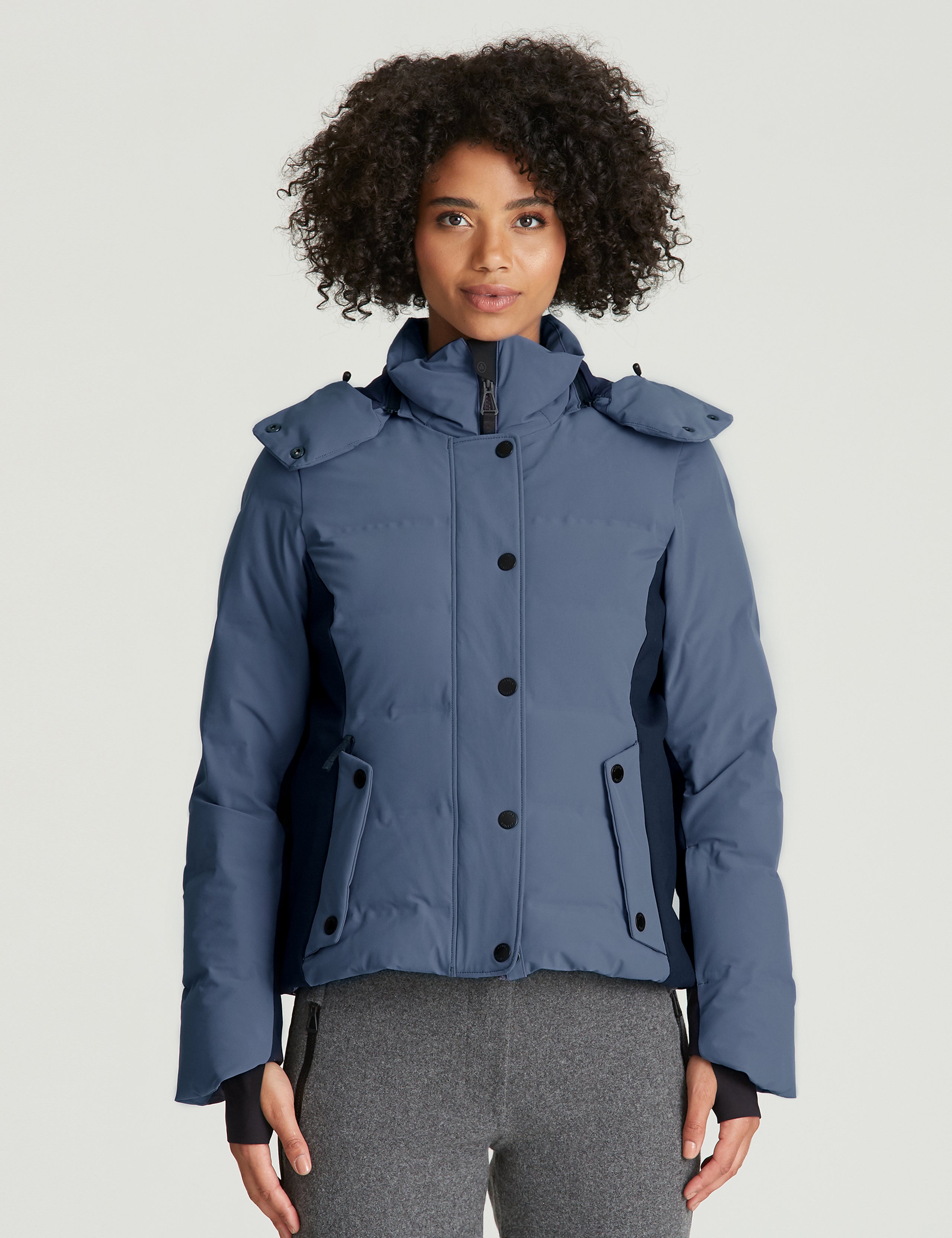 Front view of woman wearing Torino Jacket in Baltic Blue from AETHER Apparel.